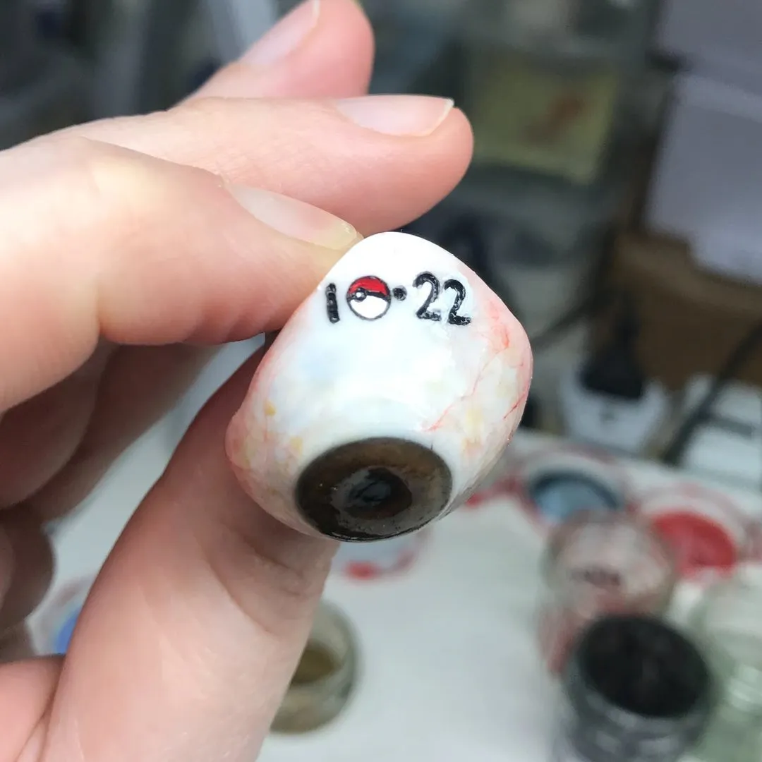 Close-up of a fully personalised prosthetic eye, with unique iris patterning and subtle colour variations tailored to the wearer