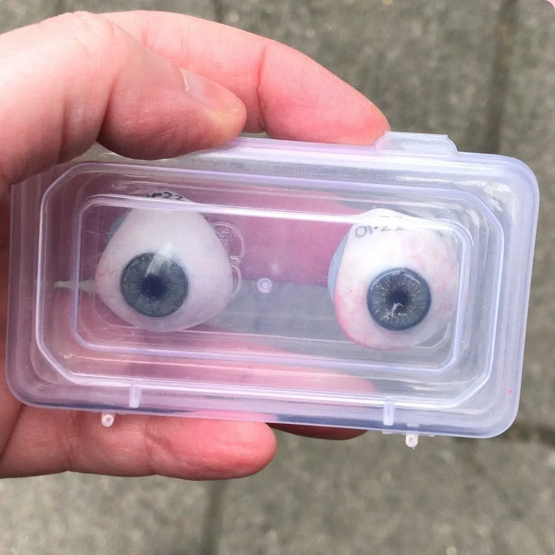 Prosthetic eyes stored safely in a protective container